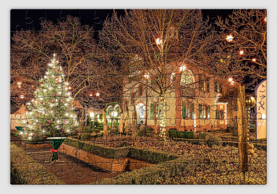 Égősorral díszített parkot ábrázoló karácsonyi kirakó